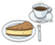 Eine Tasse Kaffee und ein Stück Kuchen auf einem Teller